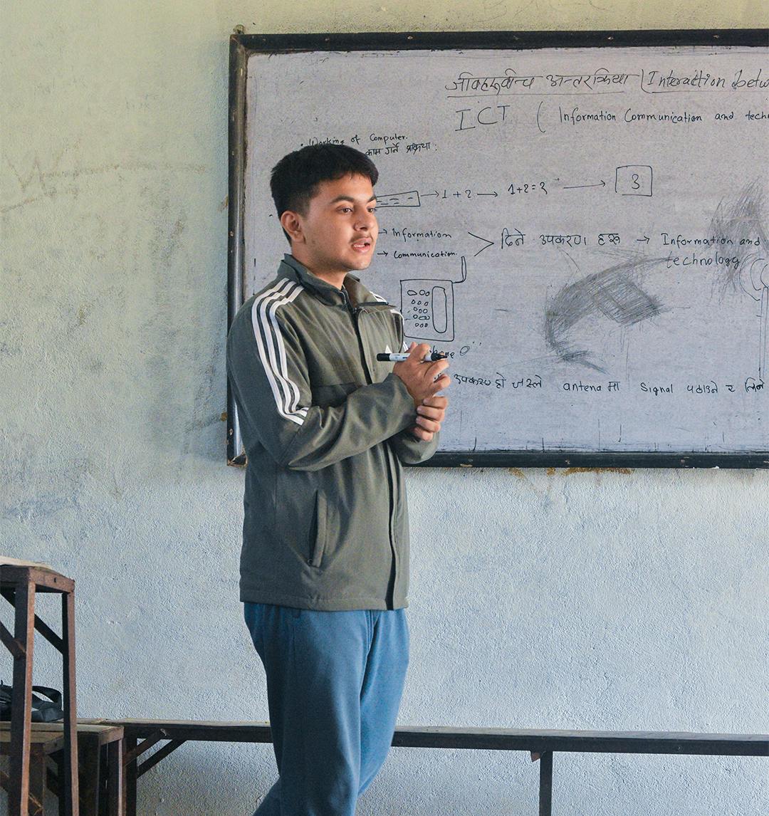 Nirmal teaching CS to grade 9 student from remote Nepal.